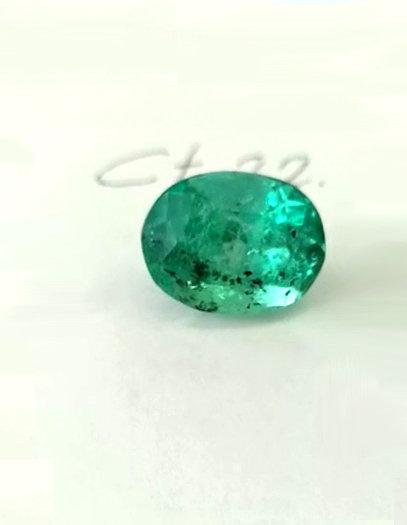 22.70 Colombian Emerald Oval faceted Cabuchon